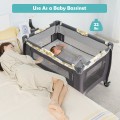 Image of Costway 4-in-1 Convertible Portable Baby Playard Newborn Napper with Music and Toys